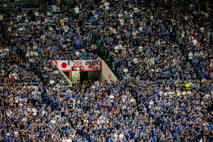 Dense crowd of spectators fill stadium seating at FIFA World Cup 2026.