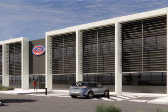 Architectural rendering of the new PFD facility in Western Australia, showing the modern exterior, PFD signage, parked cars and landscaped surrounds.