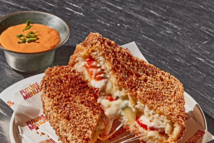 Crispy crumbed Carrozza melt filled with melted cheese and red capsicum, served with romescollaise dipping sauce.