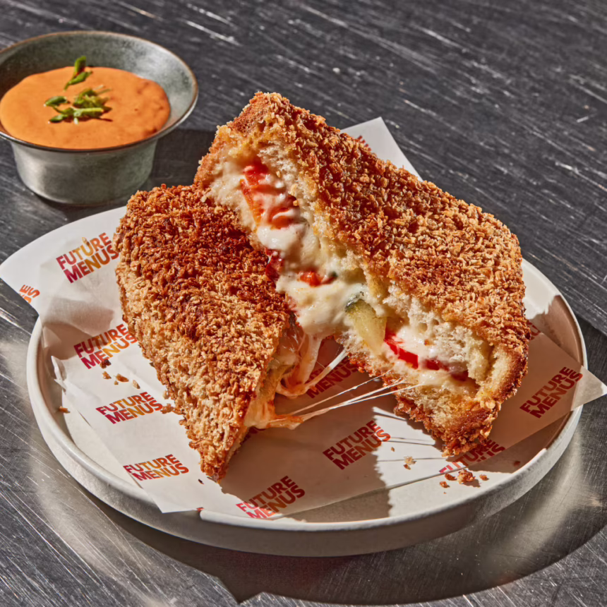 Crispy crumbed Carrozza melt filled with melted cheese and red capsicum, served with romescollaise dipping sauce.