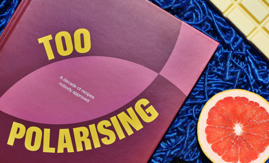 Brodie Nalywajko’s Too Polarising cookbook styled with vivid blue background, white chocolate and a halved grapefruit.