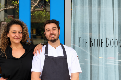 Chef Dylan Cashman standing outside The Blue Door Bellingen