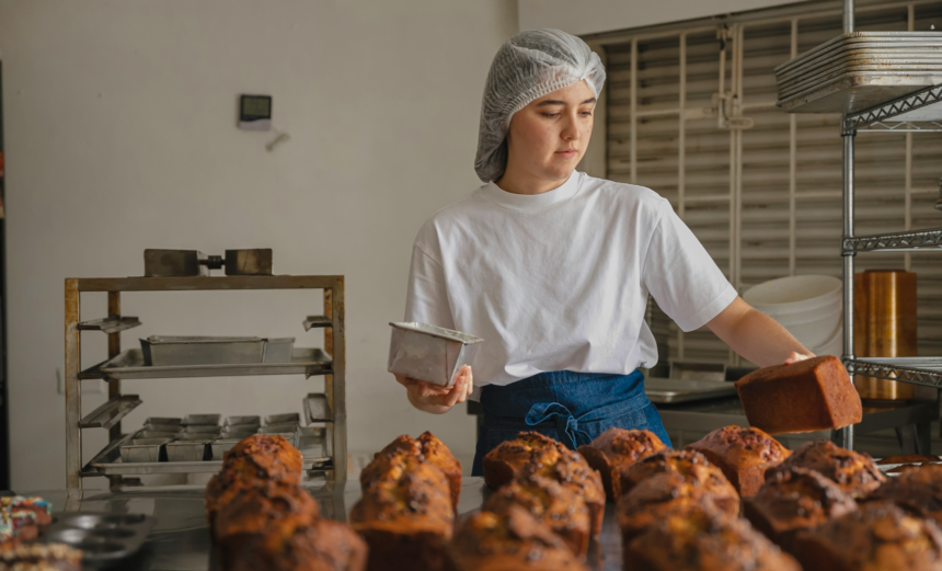 Baker preparing baked goods in a bakery